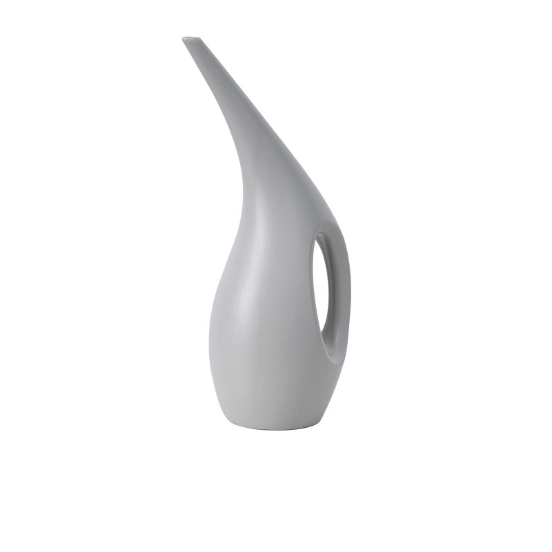 Modern Curves: Sophisticated Watering Can